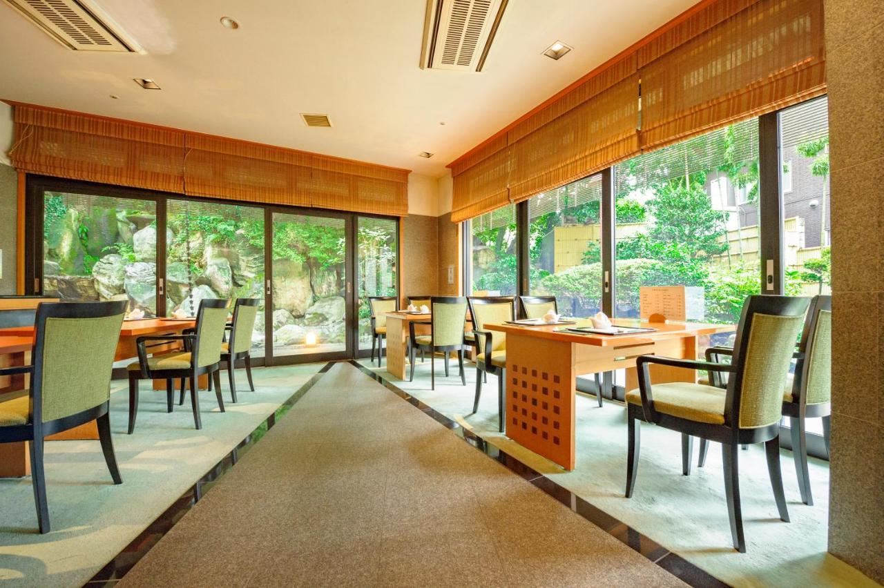 Kanazawa Hakuchoro Hotel Sanraku -Natural Hot Spring- Екстериор снимка Interior of a restaurant in Tokyo