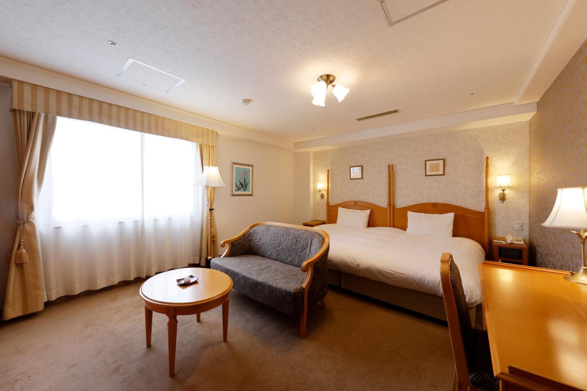 Kanazawa Hakuchoro Hotel Sanraku -Natural Hot Spring- Екстериор снимка A room at the hotel